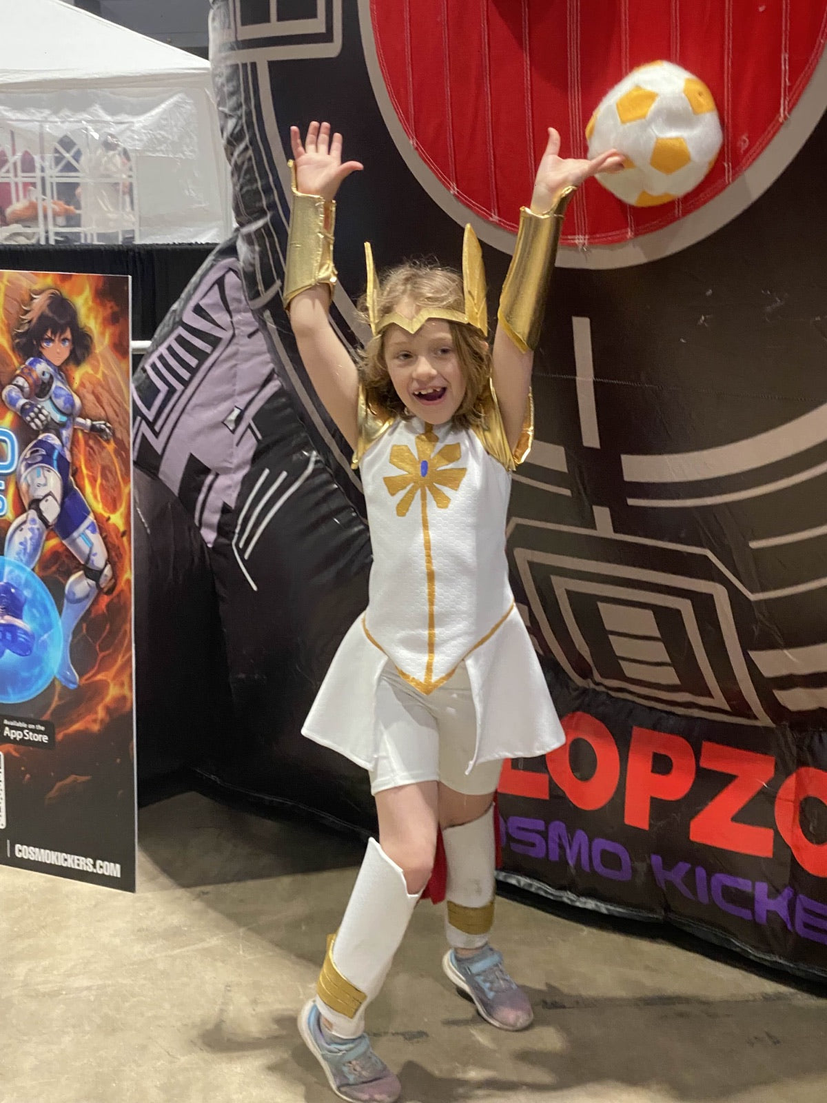 Cosplayer celebrating after throwing a Velcro ball at the target