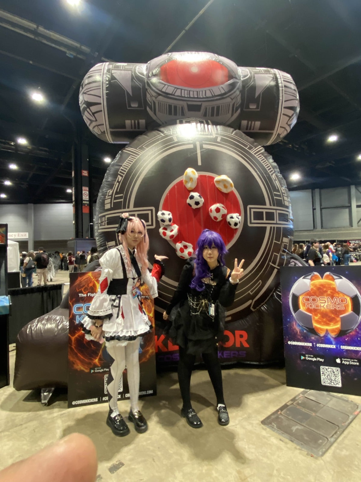 Two event guests posing with Boss Fight Targets